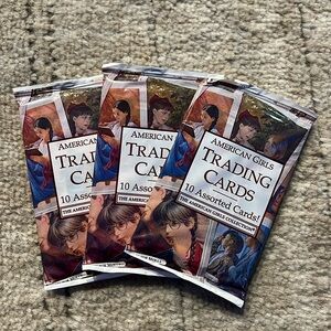 3 unopened packs of American girl trading cards
